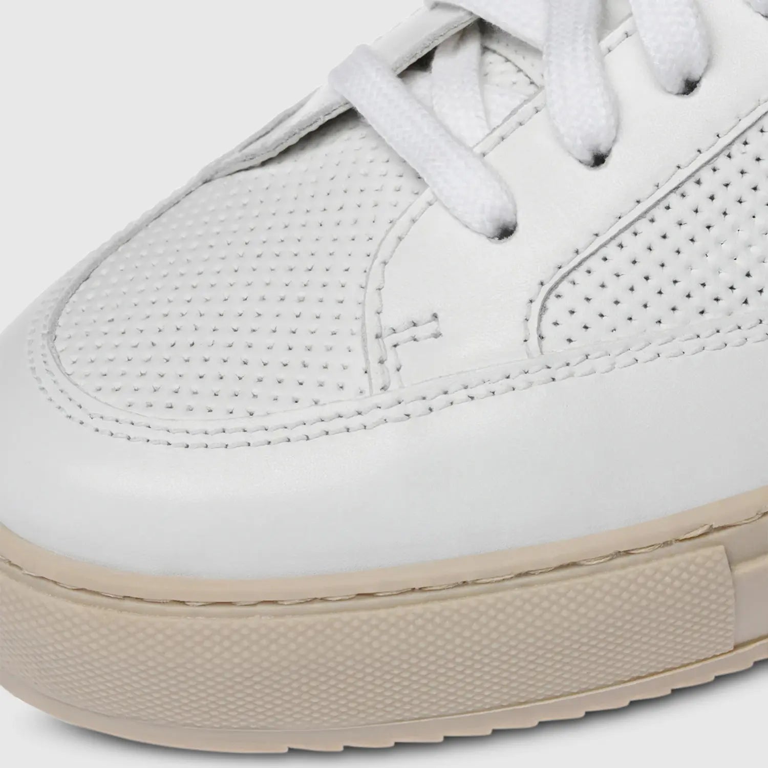 Toni Cochin Holes White